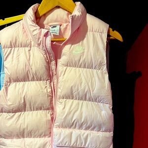 Pink puffy Nike vest